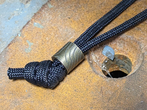 Simple Small Brass Lanyard Bead with Topographical Pattern and a Free Paracord Lanyard
