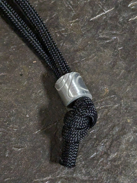 Simple Small Aluminum Lanyard Bead with Topographical Pattern and a Free Paracord Lanyard